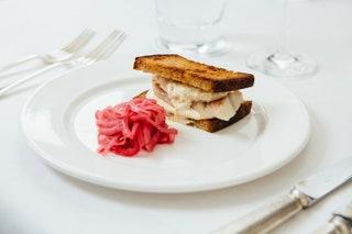 BEST FOR a postcocktail pickmeup    THE ORDER the smokedeel sandwich  This legendary  hangout likes to dine out on its...